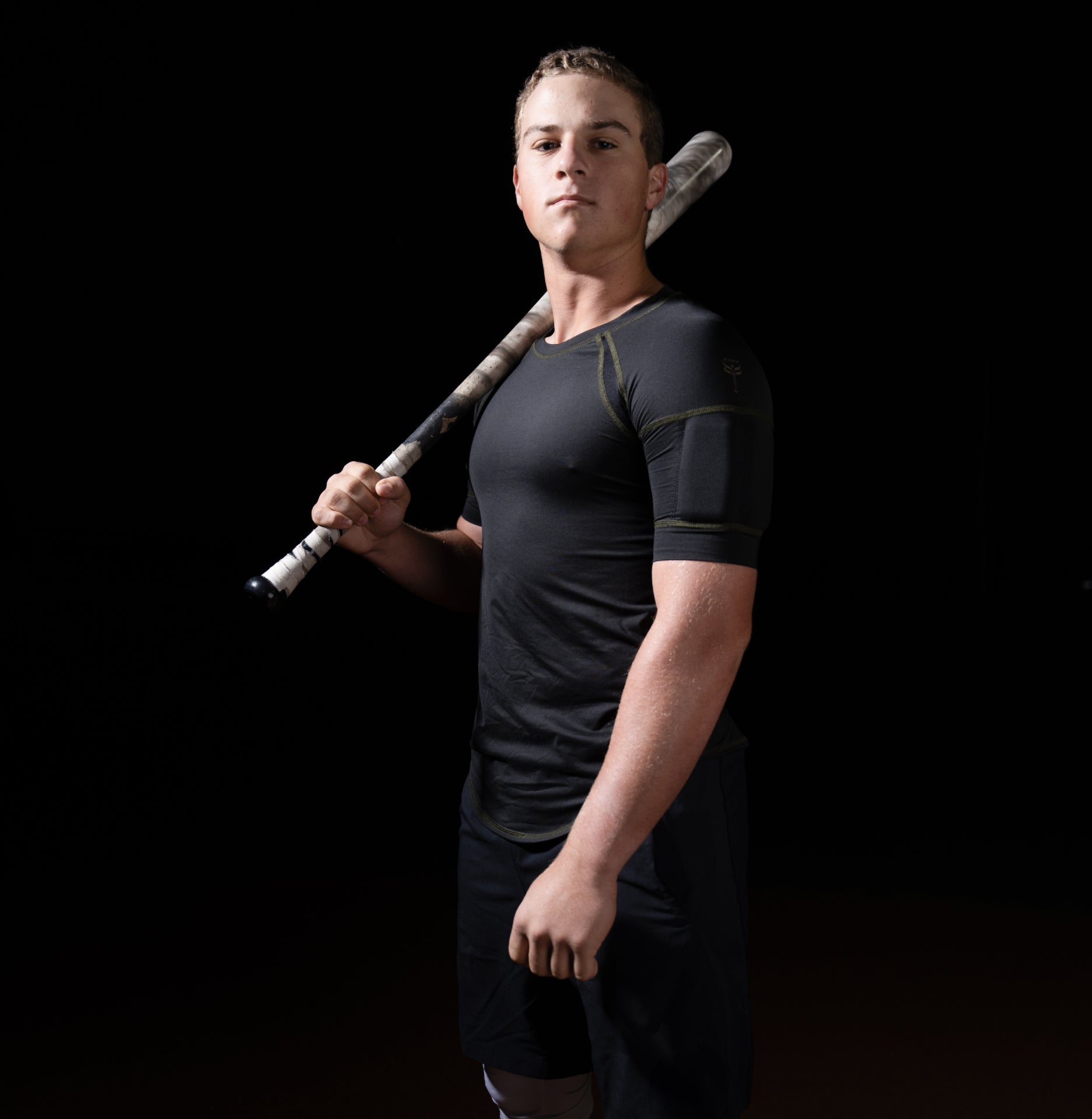 Baseball player with weighted gear