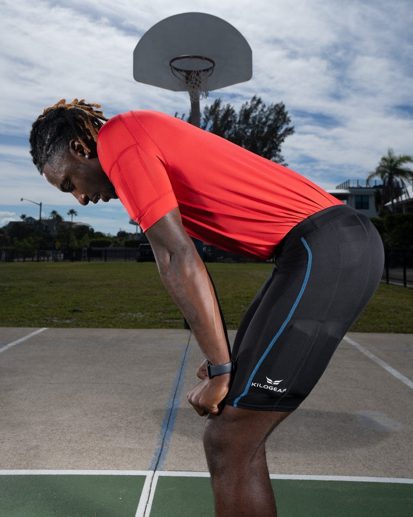Men's CUT Weighted Compression Short side view showing weights on the quads