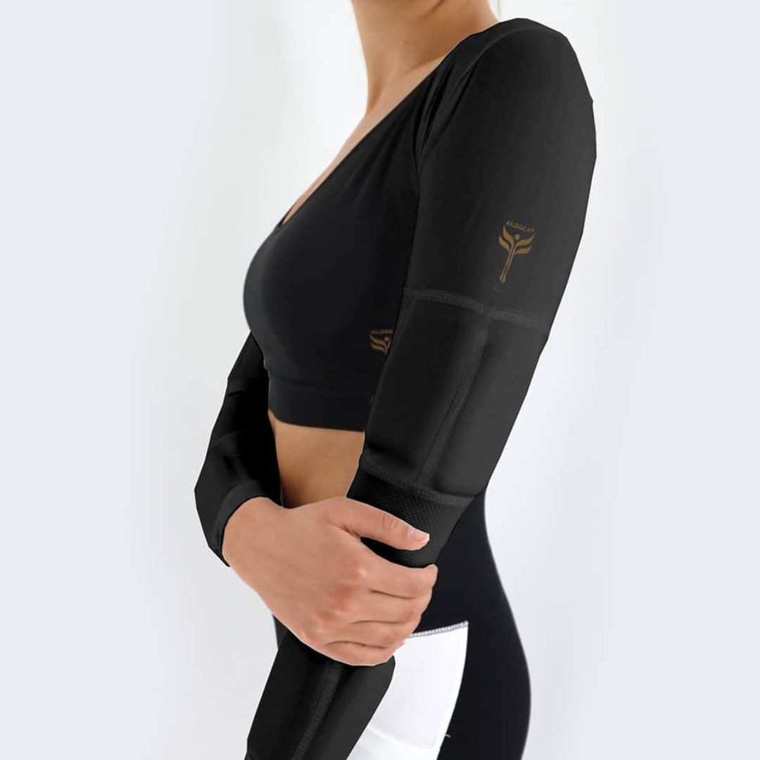 Side view women's weighted black power shrug with weights down the arm