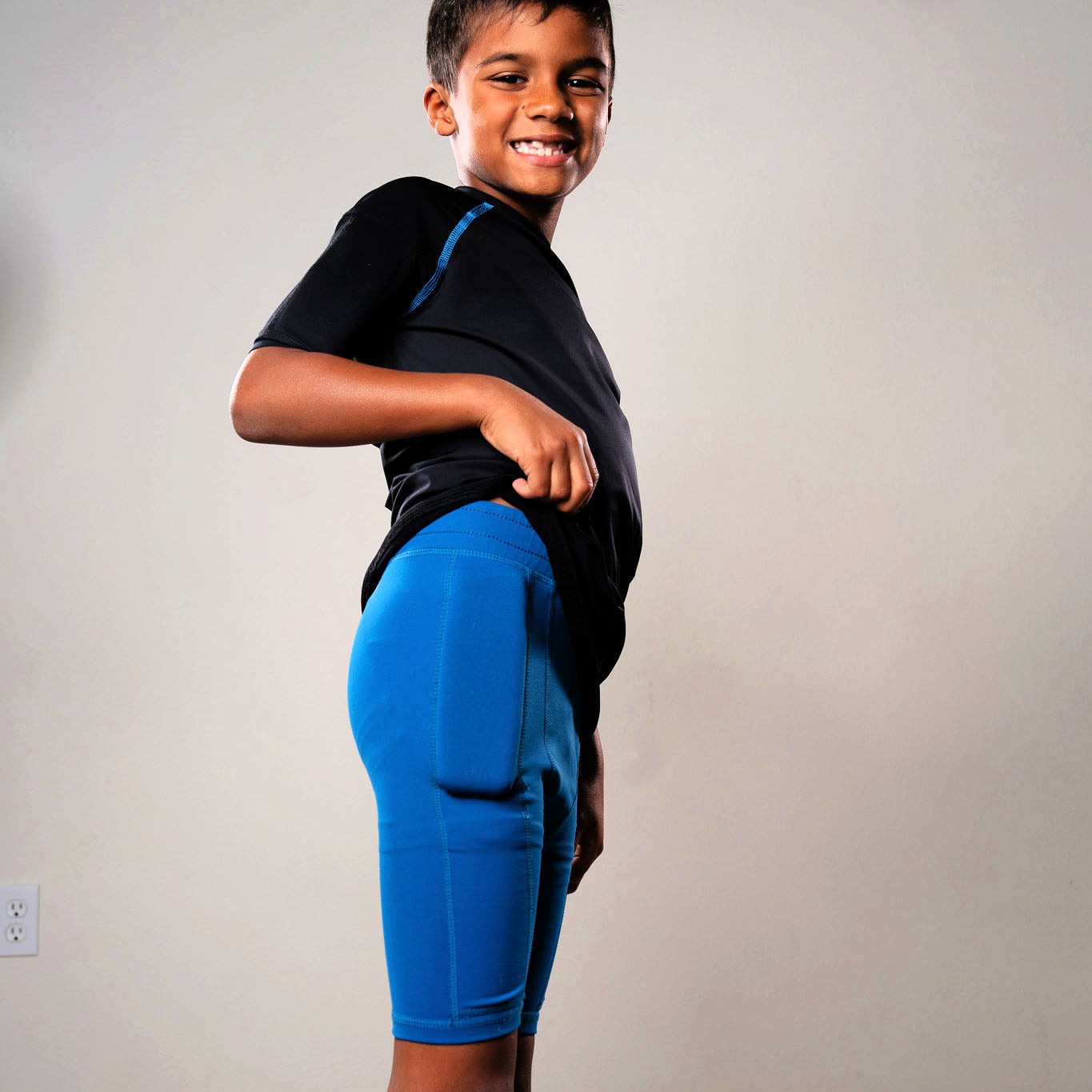 Boy's blue weighted training short for sports and strength training.