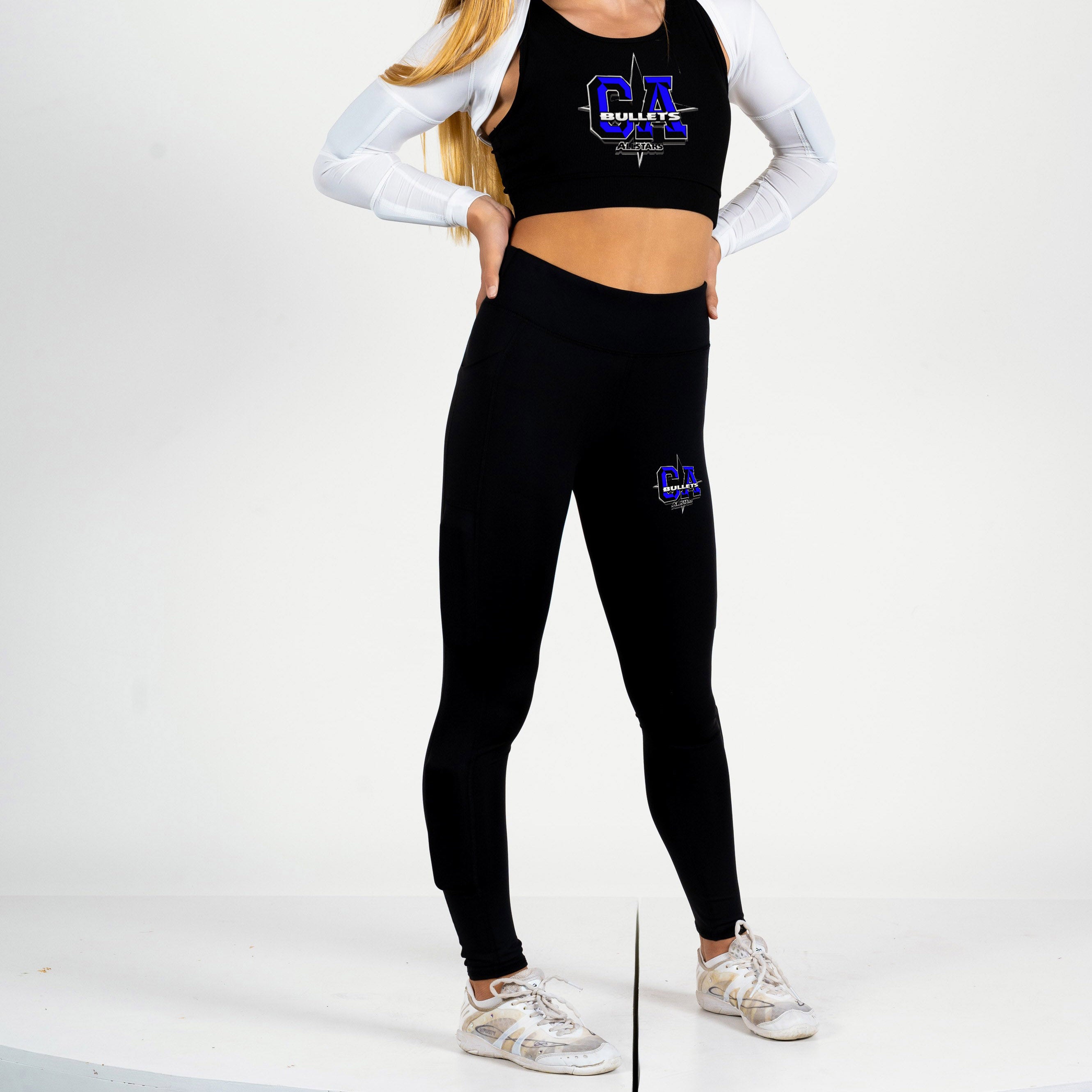 Girl wearing black kilogear cut legging showing weights on the calf and quad, side view