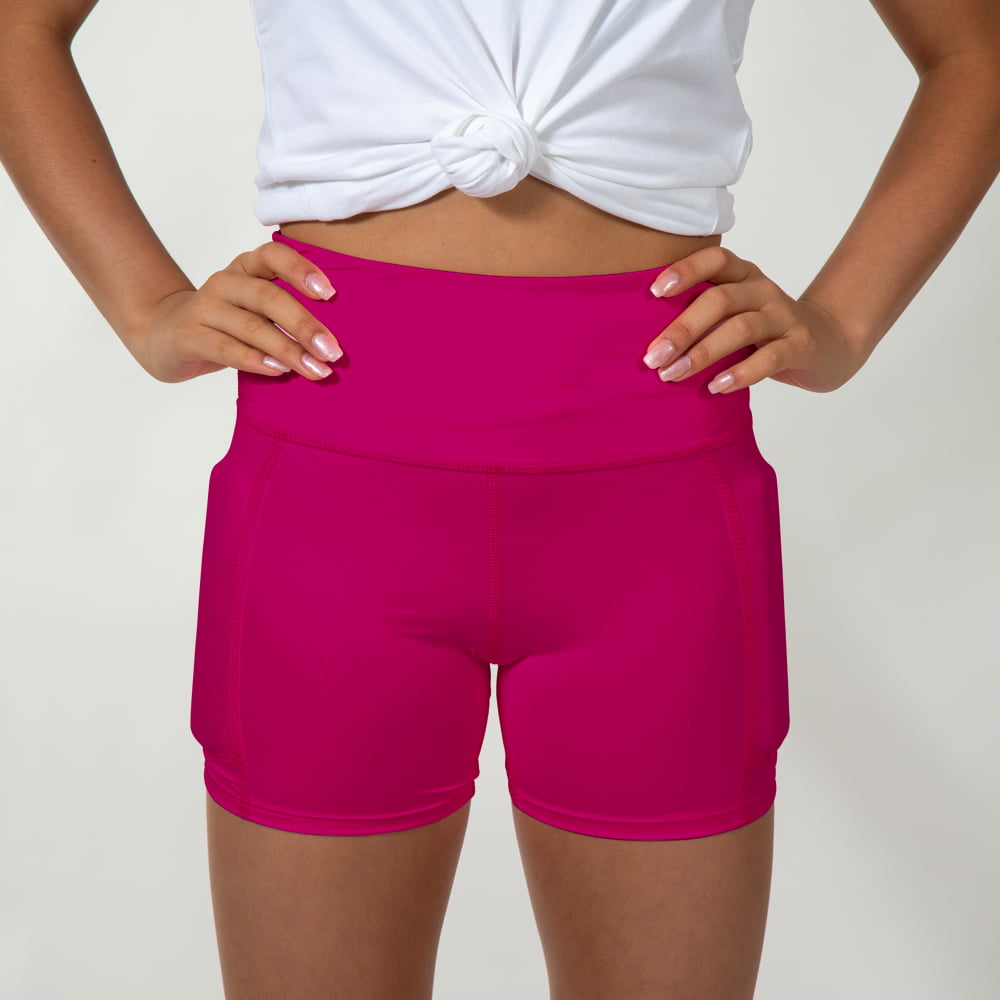 Up close picture wearing the hot pink shorts showing the Strong weights on the side of the leg, front view