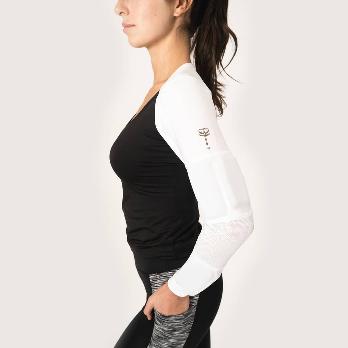 Side view of woman wearing the white weighted long sleeve
